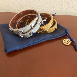 TWO Tory Burch metallic wrap bracelets